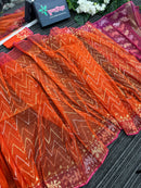 Orange halfsilk jamdani saree with pink paar