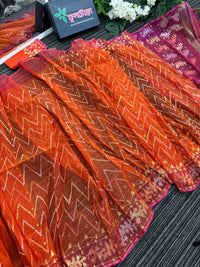 Orange halfsilk jamdani saree with pink paar