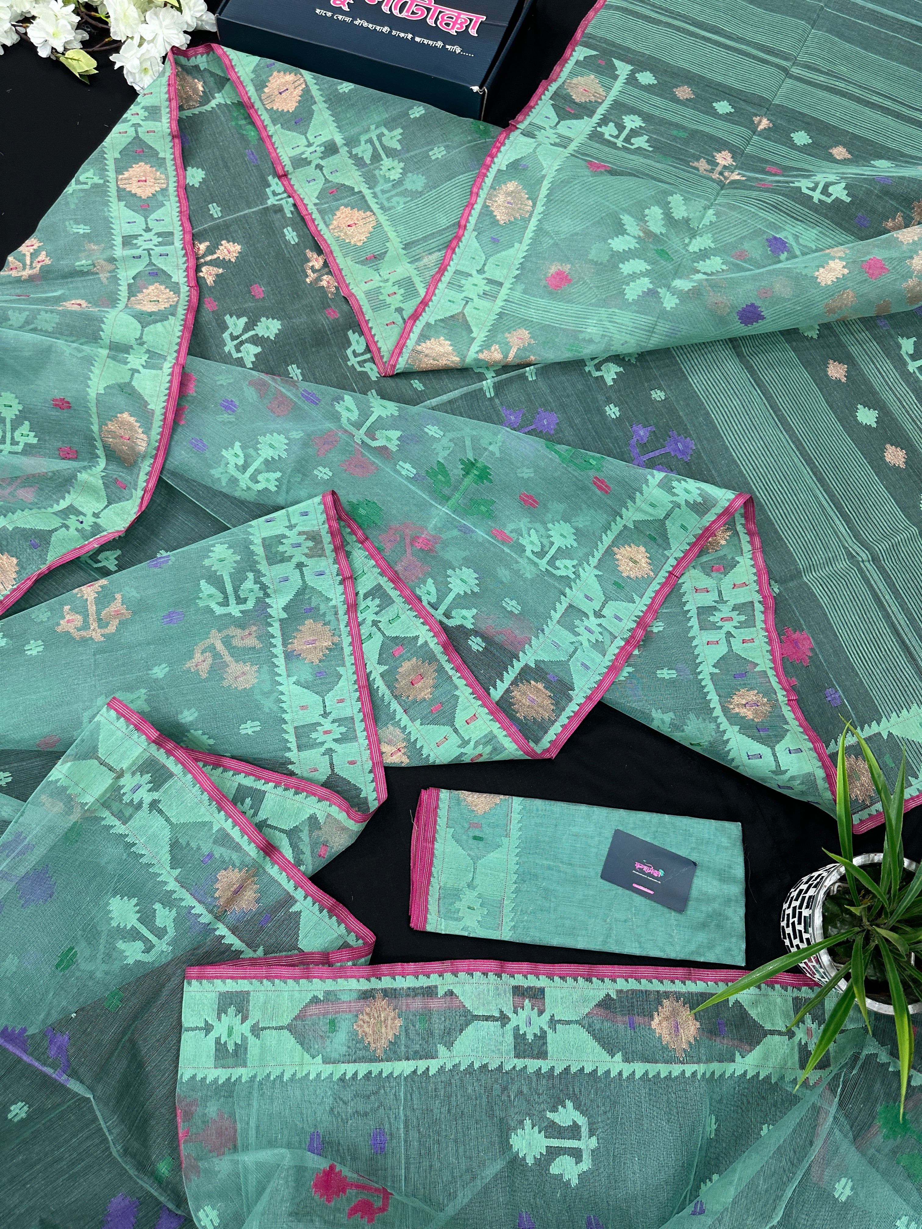 Bright Teal Blue dhakai Jamdani saree with pink border all over work soft count.