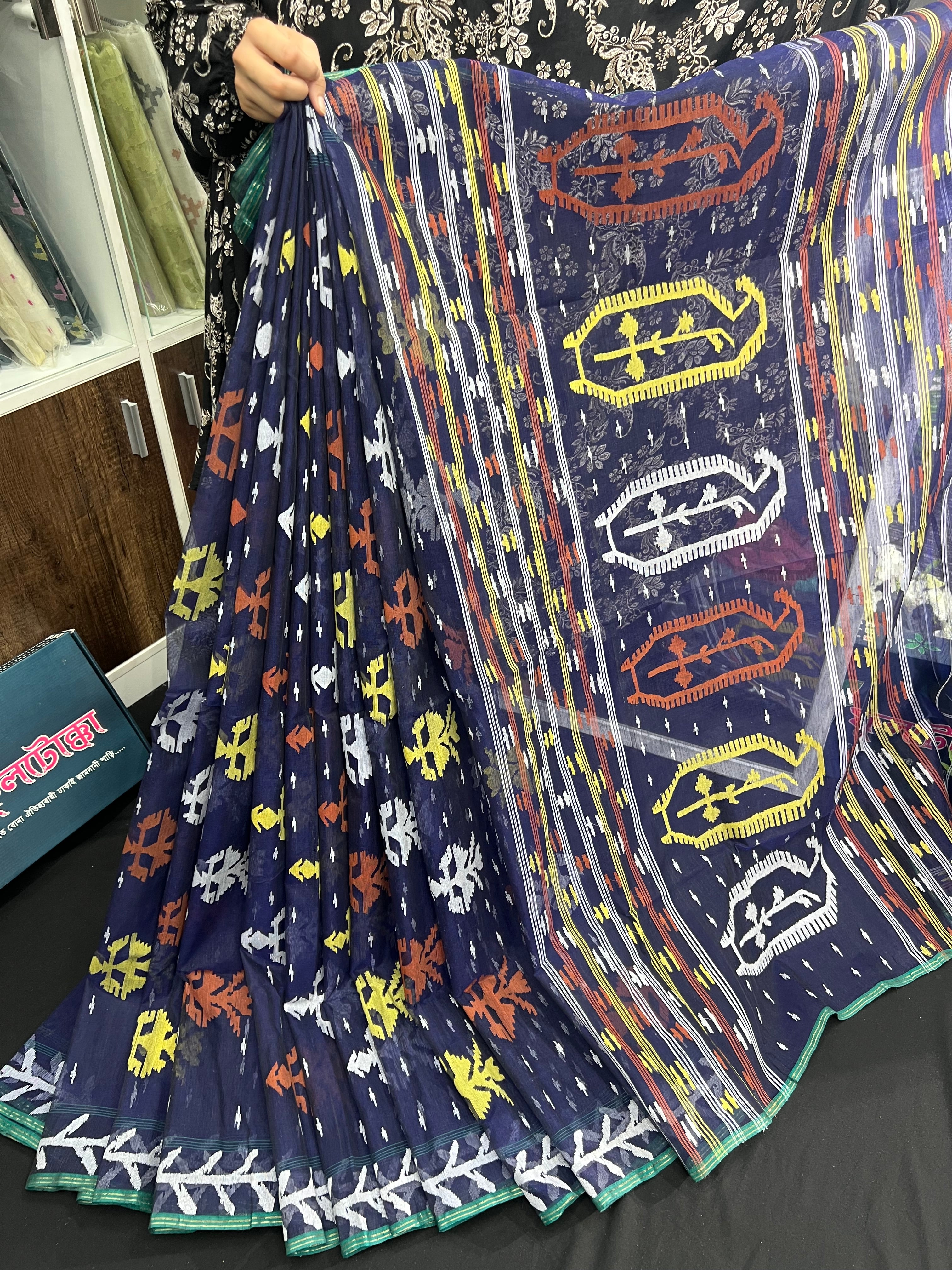 Deep blue halfsilk jamdani saree with orange yellow white threads work