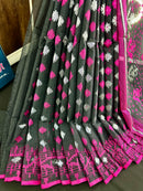 Black cotton jamdani saree with magenta threads work and silver jori work
