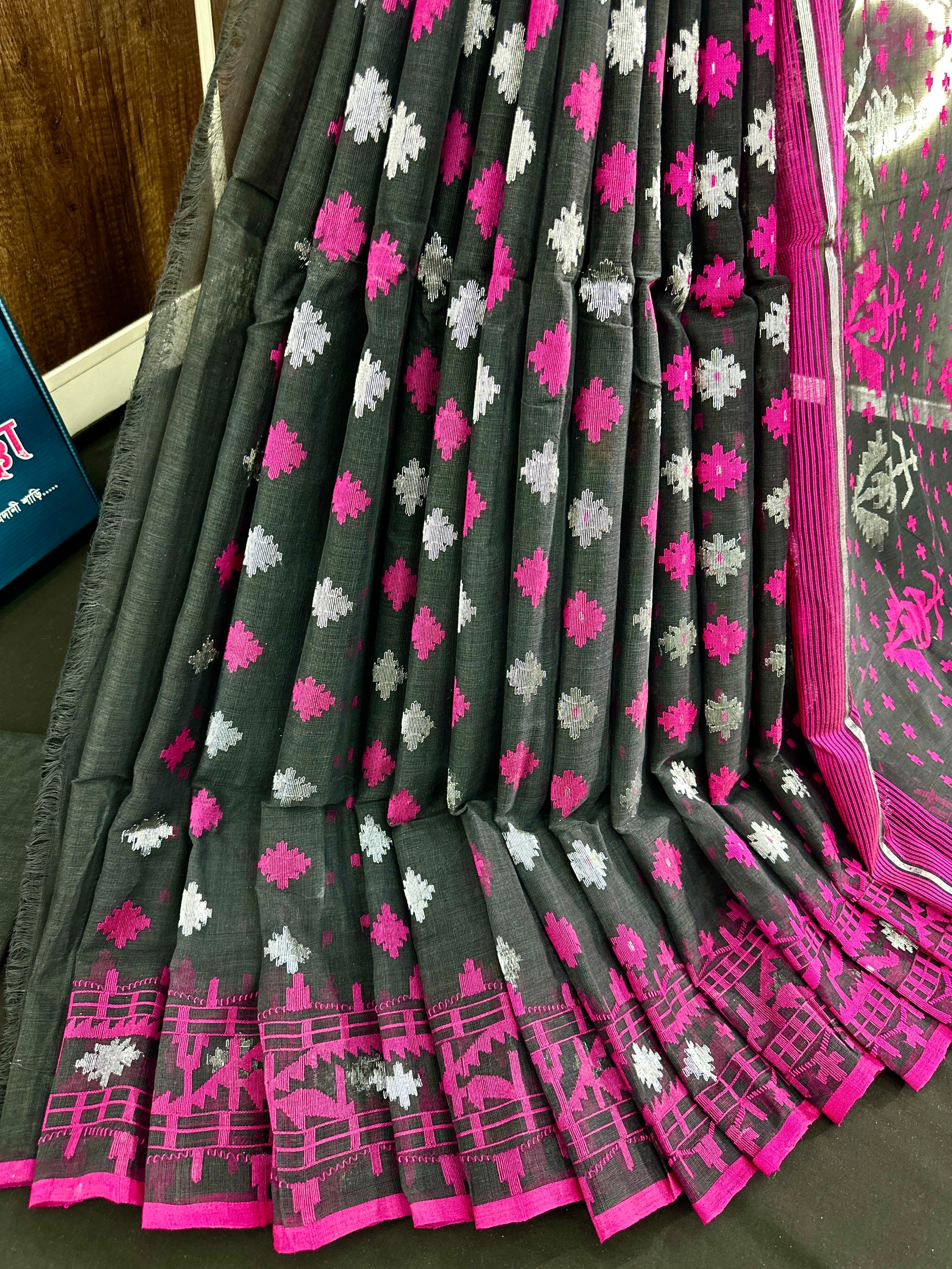 Black cotton jamdani saree with magenta threads work and silver jori work