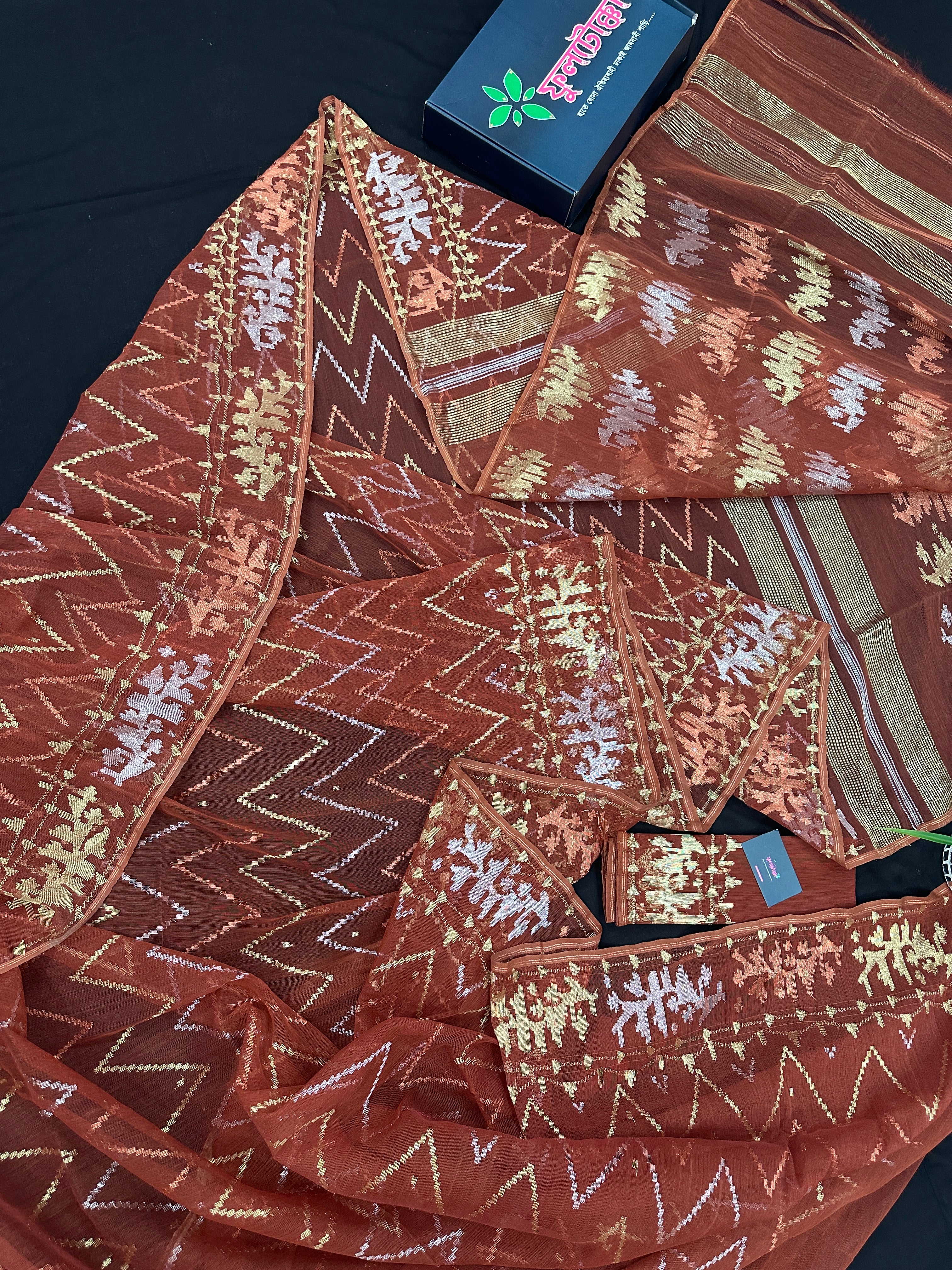 Brown reshom halfsilk jamdani saree with golden silver & copper jori work.