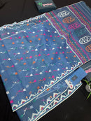Dusty blue jamdani saree with pink white blue green work and white paar.