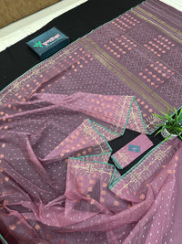 Onion colour jamdani saree with pink meena and green border.