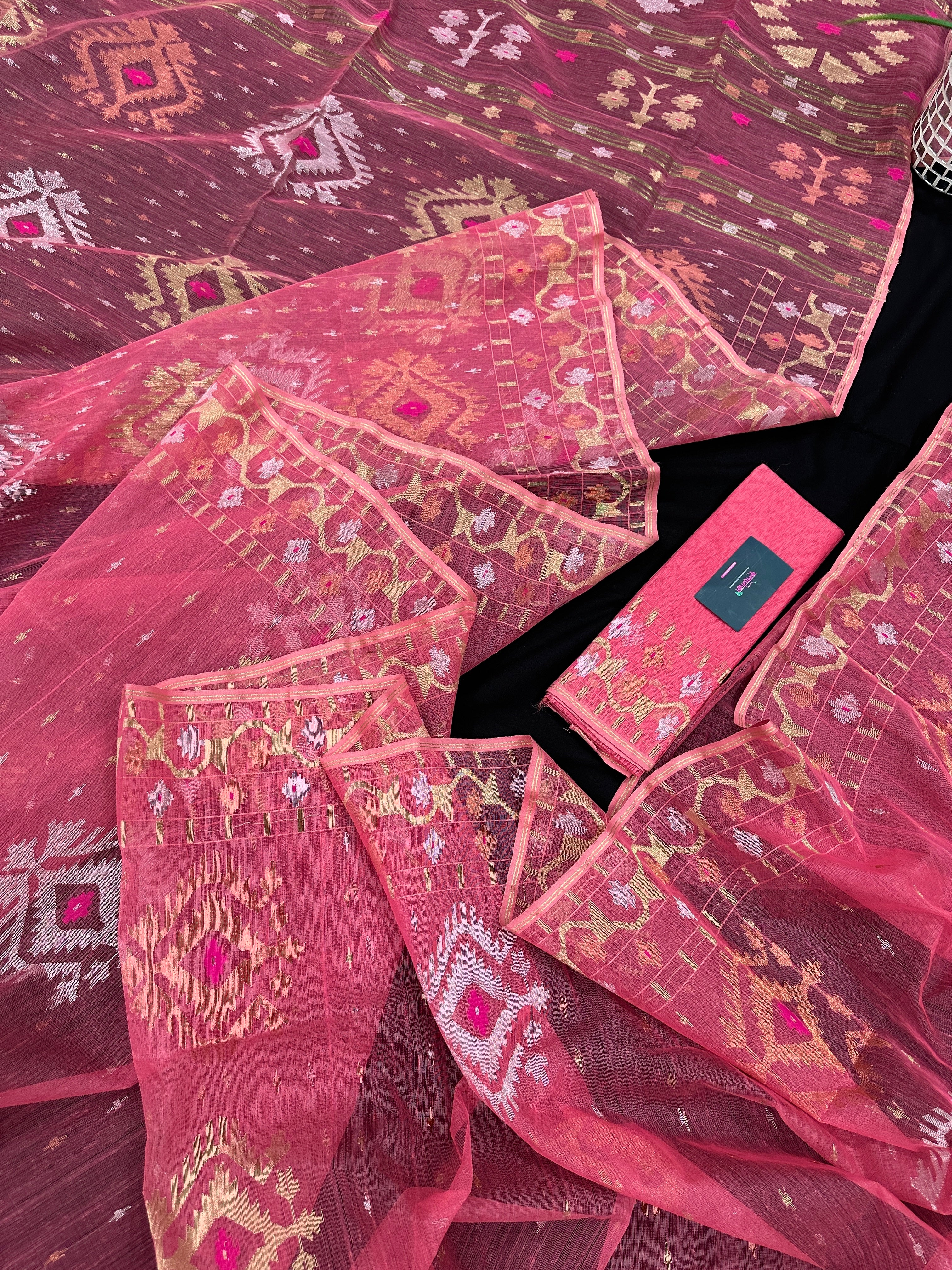 Peach pink jamdani saree with golden silver & copper jori work.