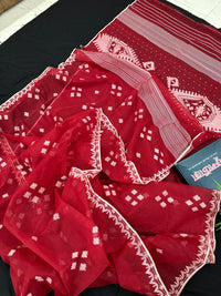 Radish Maroon cotton jamdani saree with white threads work all over work.