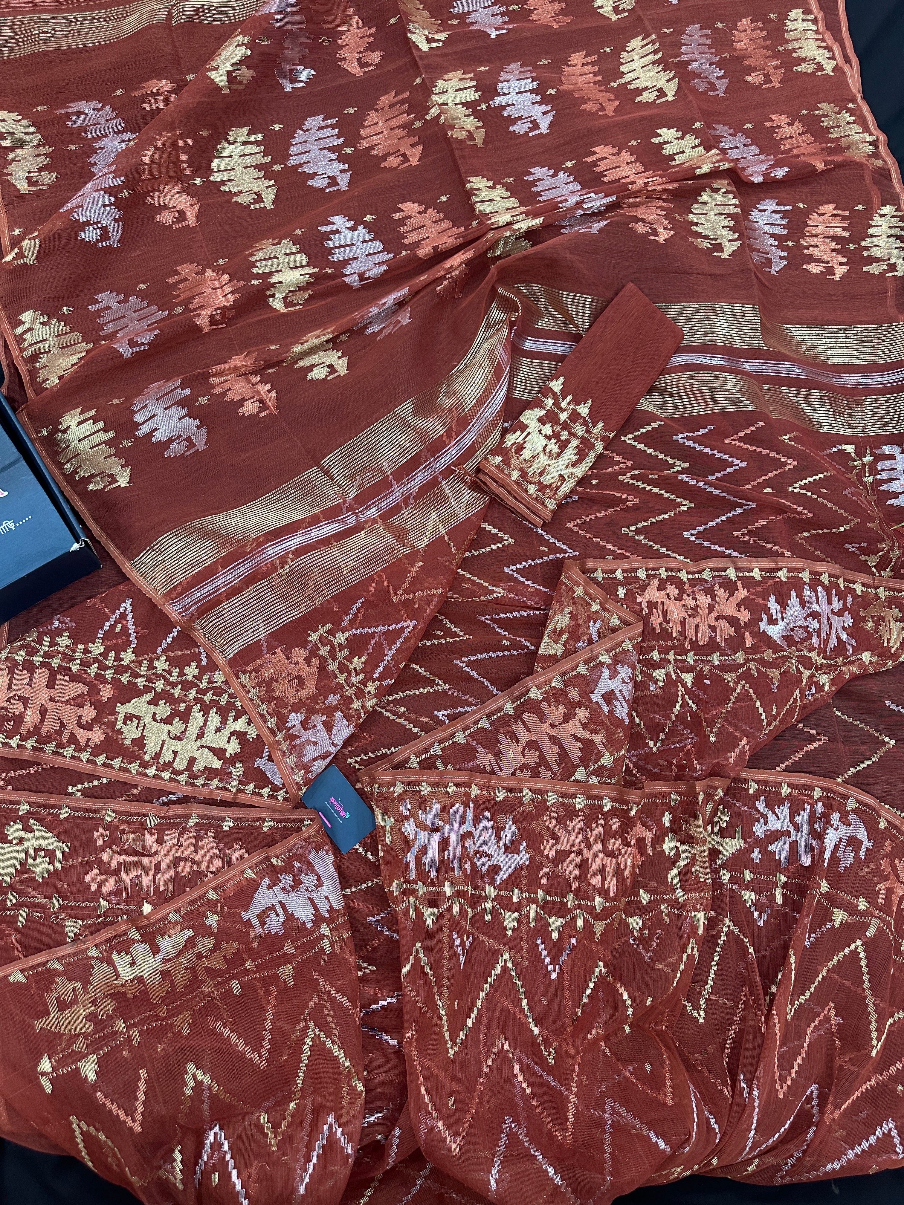 Brown reshom halfsilk jamdani saree with golden silver & copper jori work.