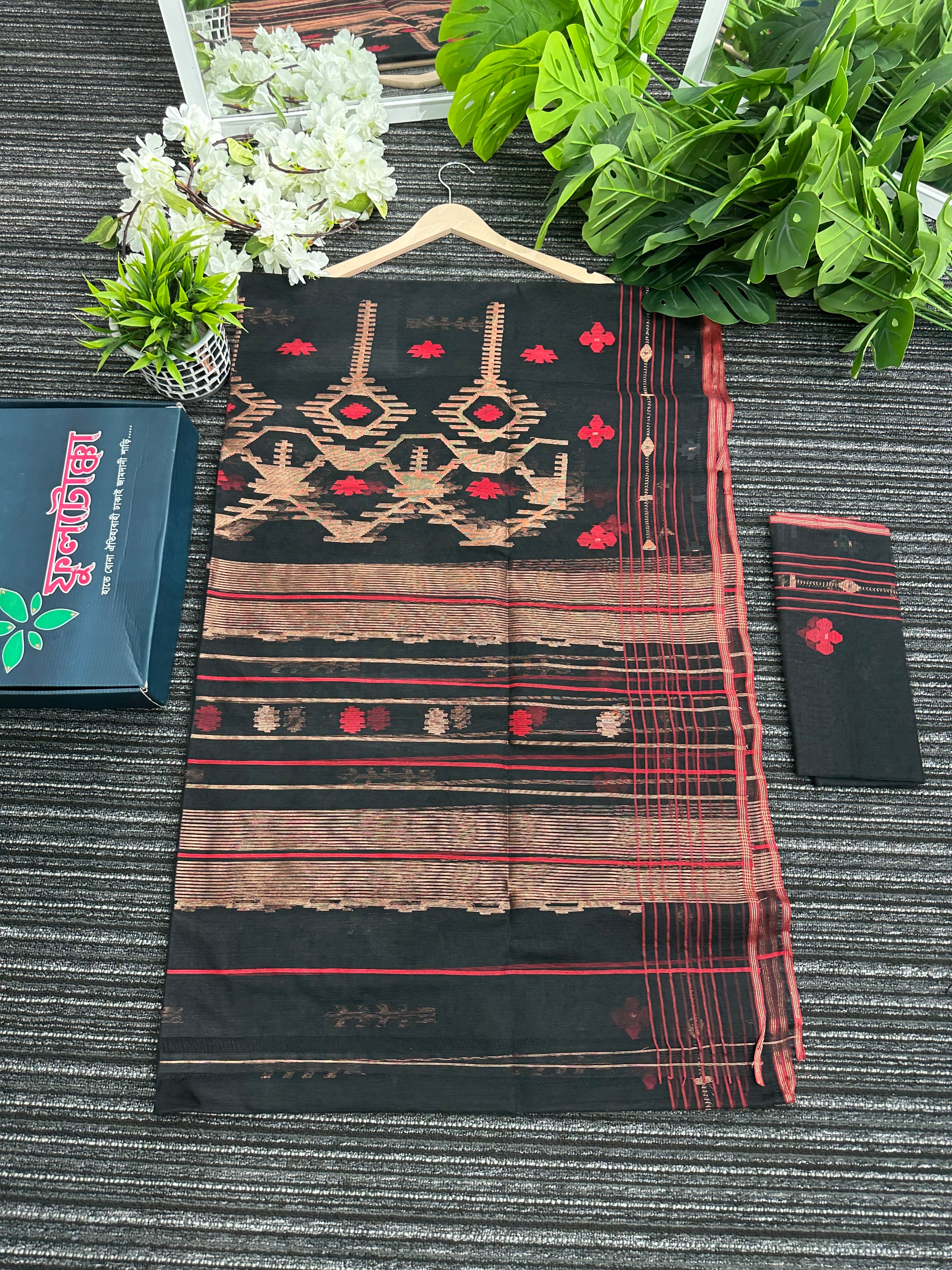 Black halfsilk jamdani saree with red paar and copper jori work