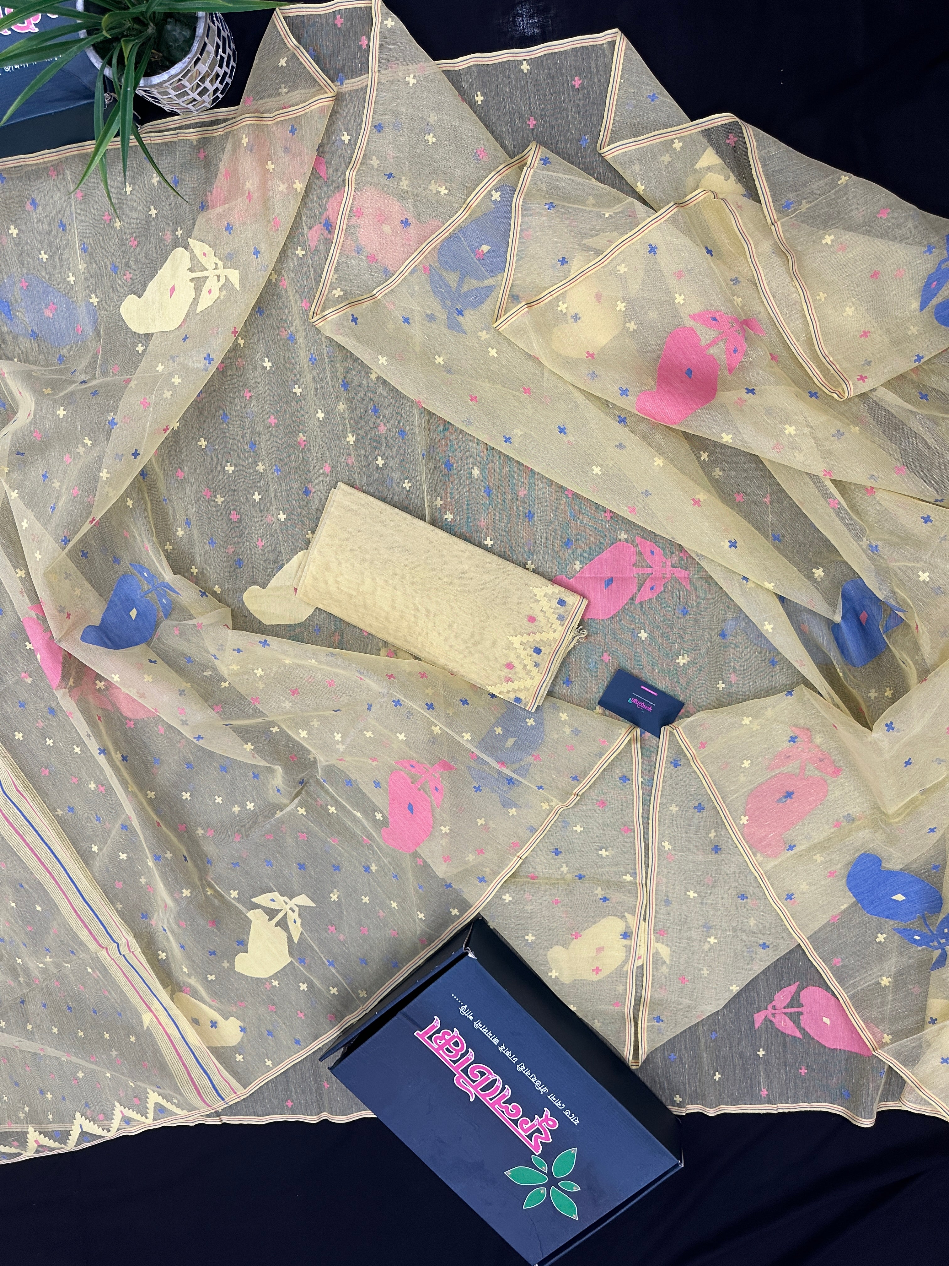 Baby yellow halfsilk jamdani saree with blue pink baby yellow threads work.