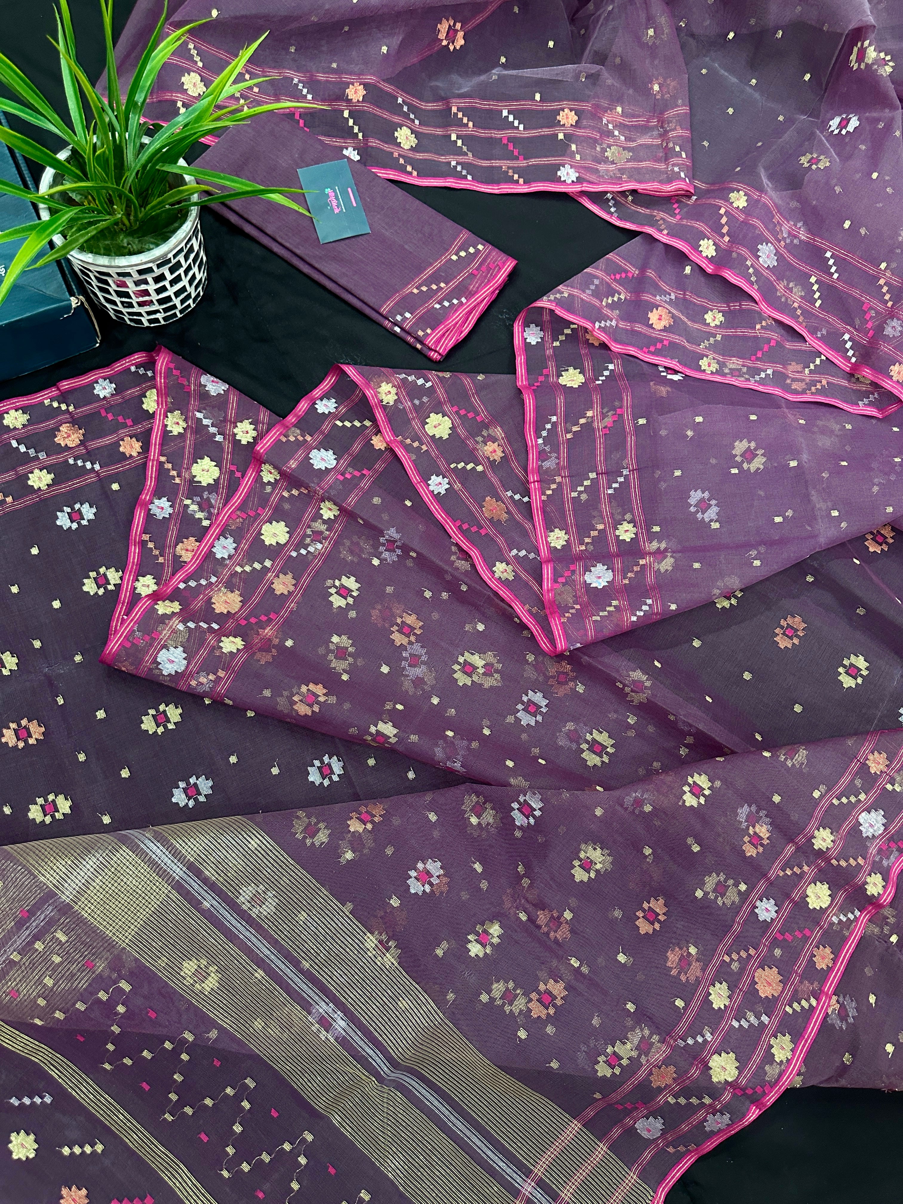 Deep bitrut dual toned jamdani saree with golden silver & copper jori work.