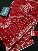 Maroon jamdani saree with white thread work.