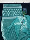 Mint cotton jamdani saree with white threads work all over work and blouse piece.