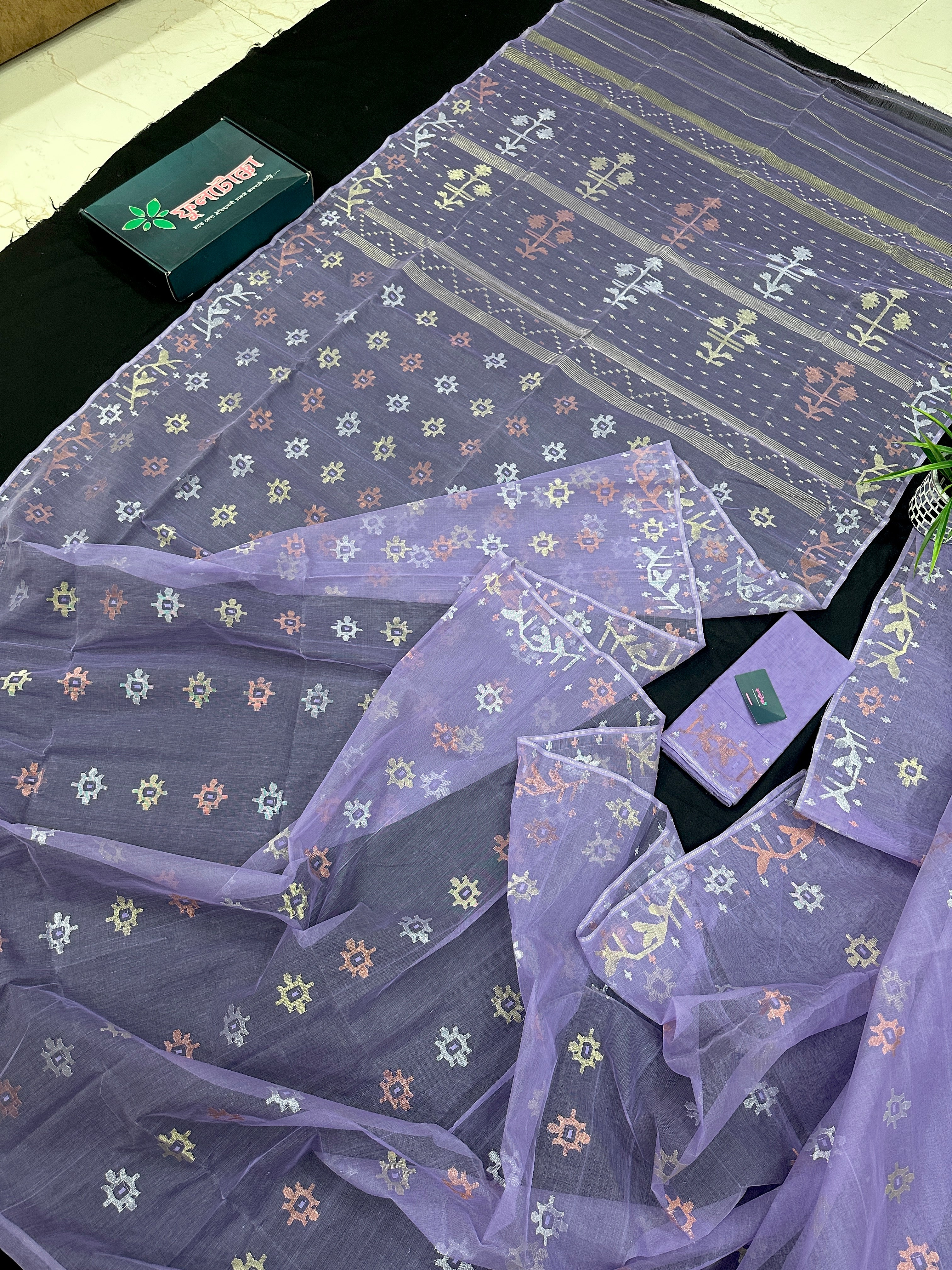Lite lavender jamdani saree with golden silver copper jori work.