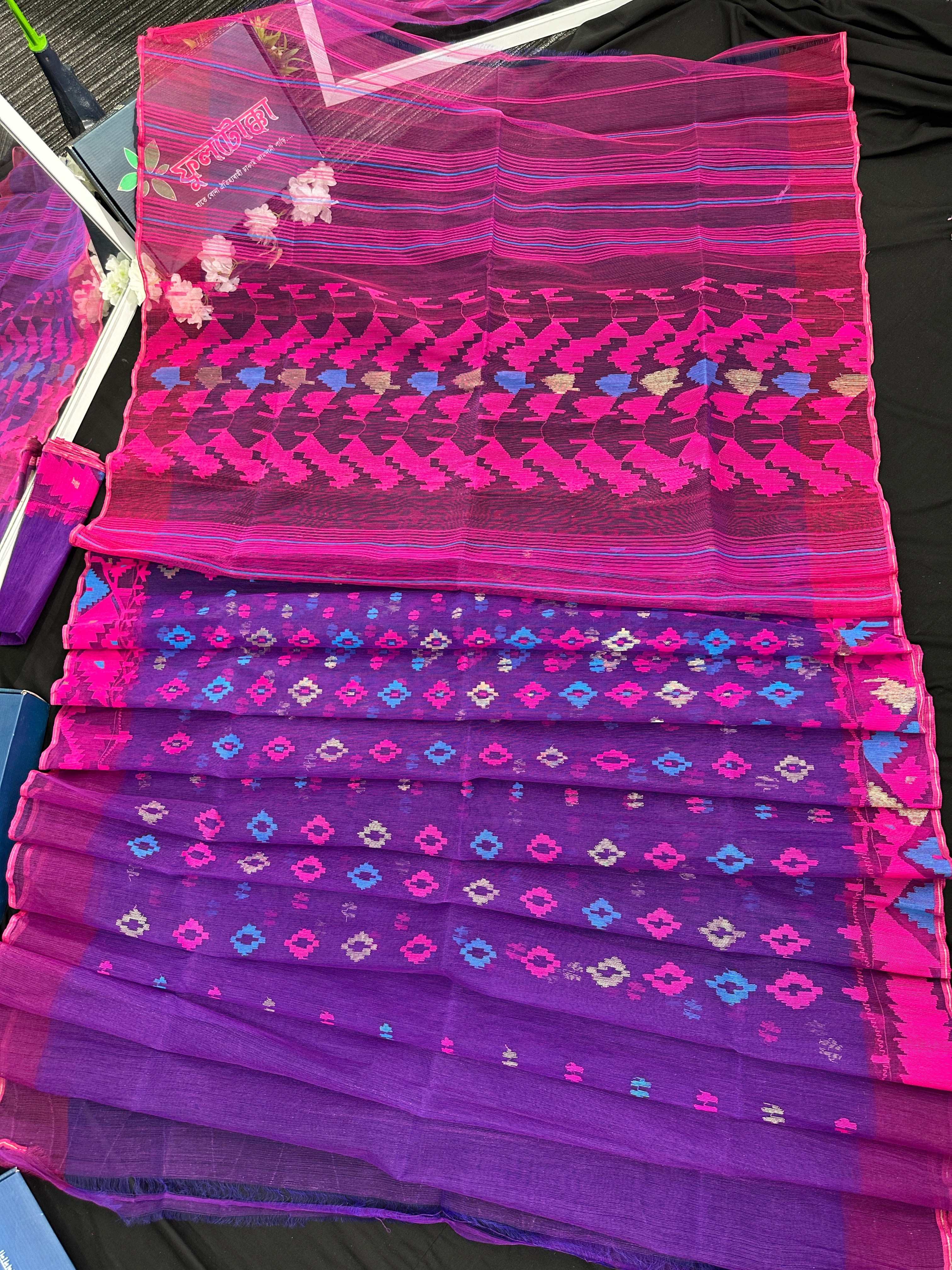 Purple halfsilk jamdani saree with blue pink threads work and golden jori work