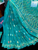 Sea green halfsilk jamdani saree with golden silver & copper jori work.