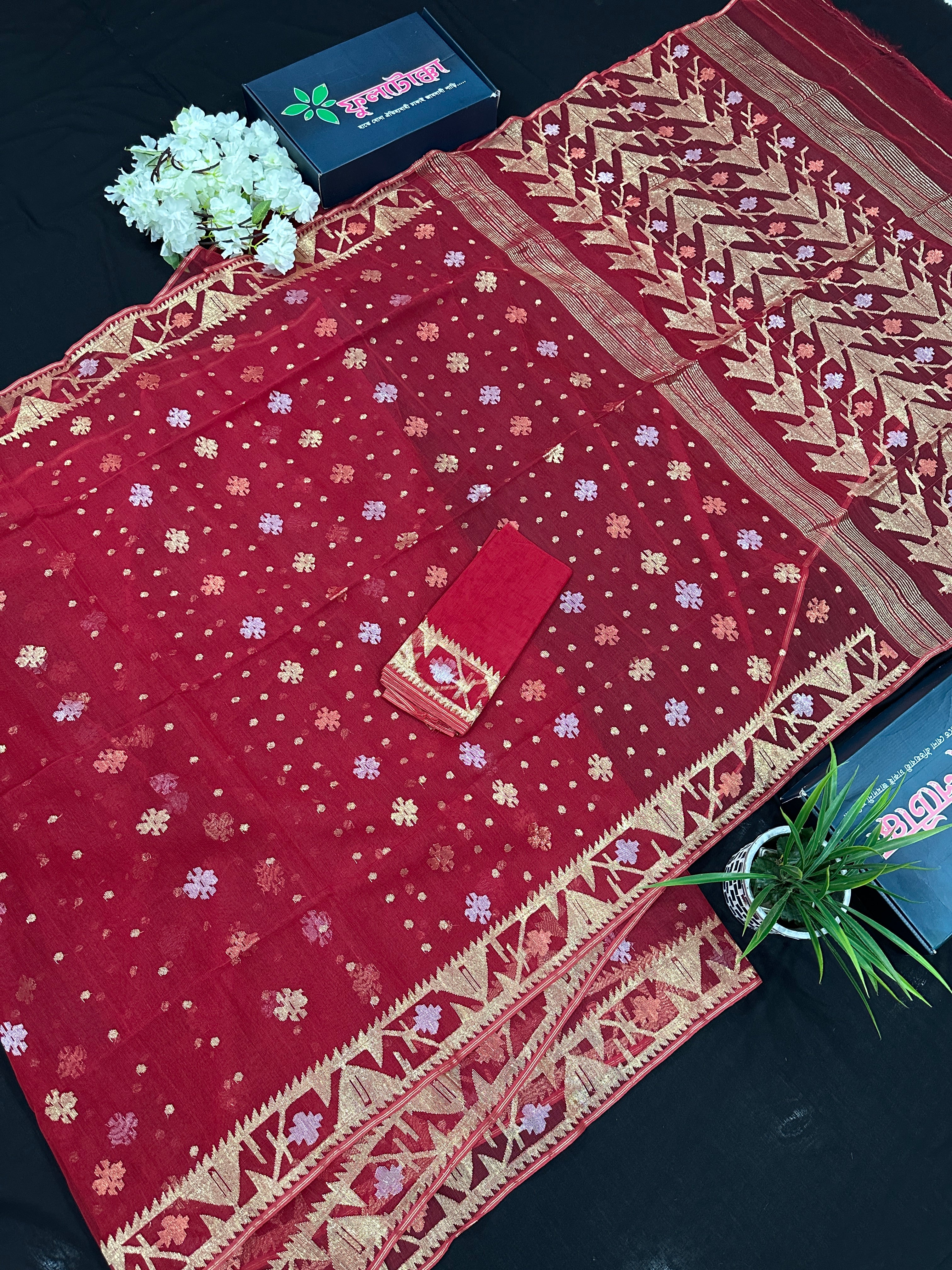 Red jamdani saree with golden jori all over work with blouse piece.