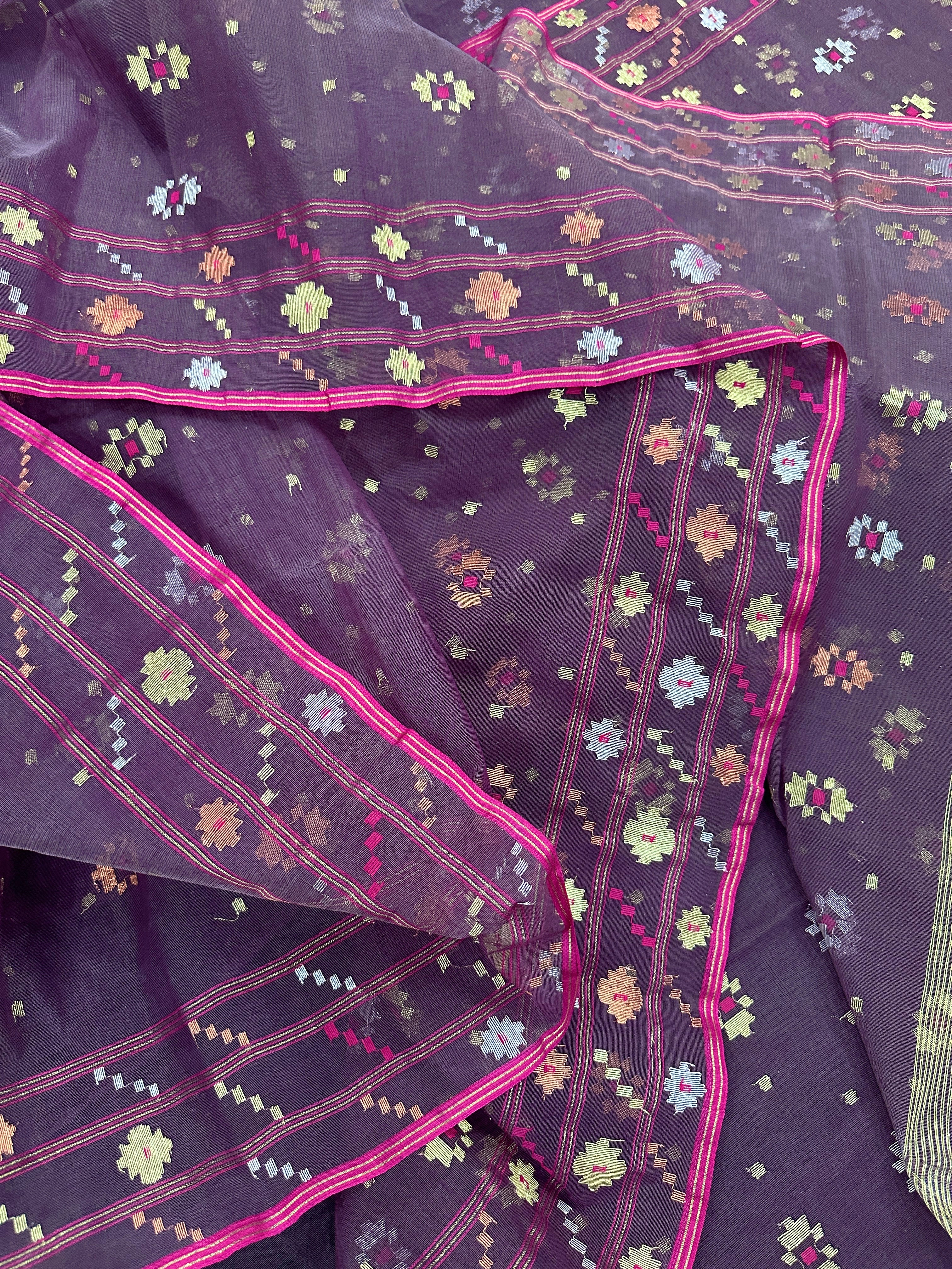 Deep bitrut dual toned jamdani saree with golden silver & copper jori work.