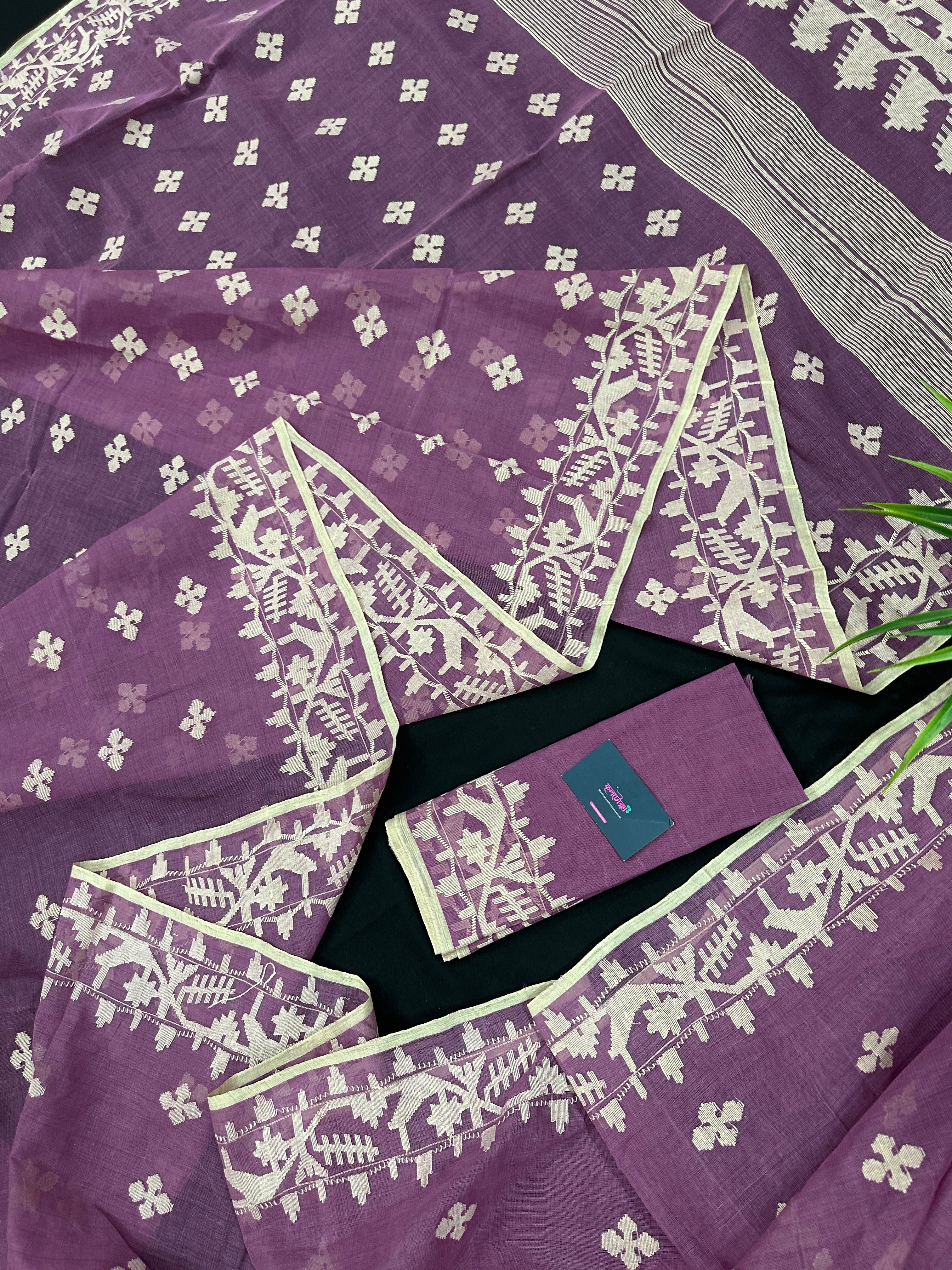 Onion cotton jamdani saree with yellowish threads work all over work.