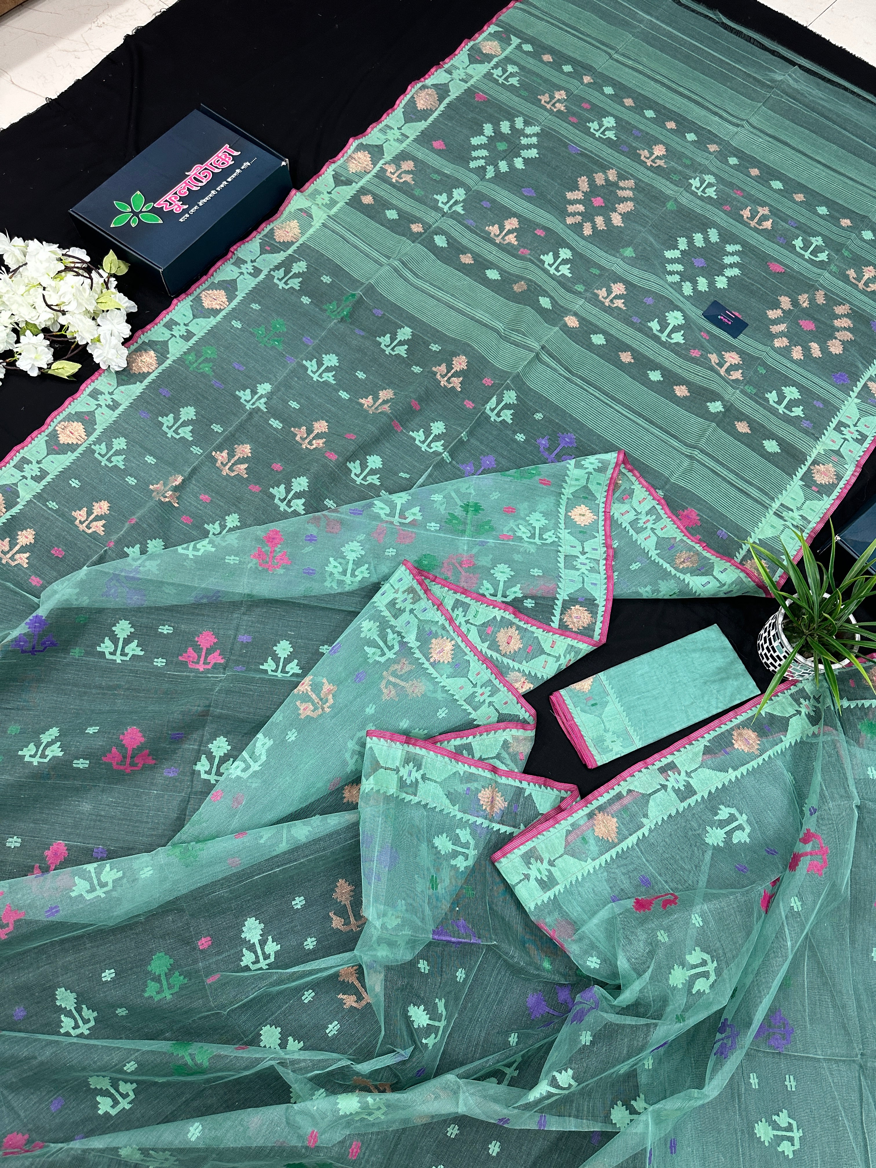 Bright Teal Blue dhakai Jamdani saree with pink border all over work soft count.