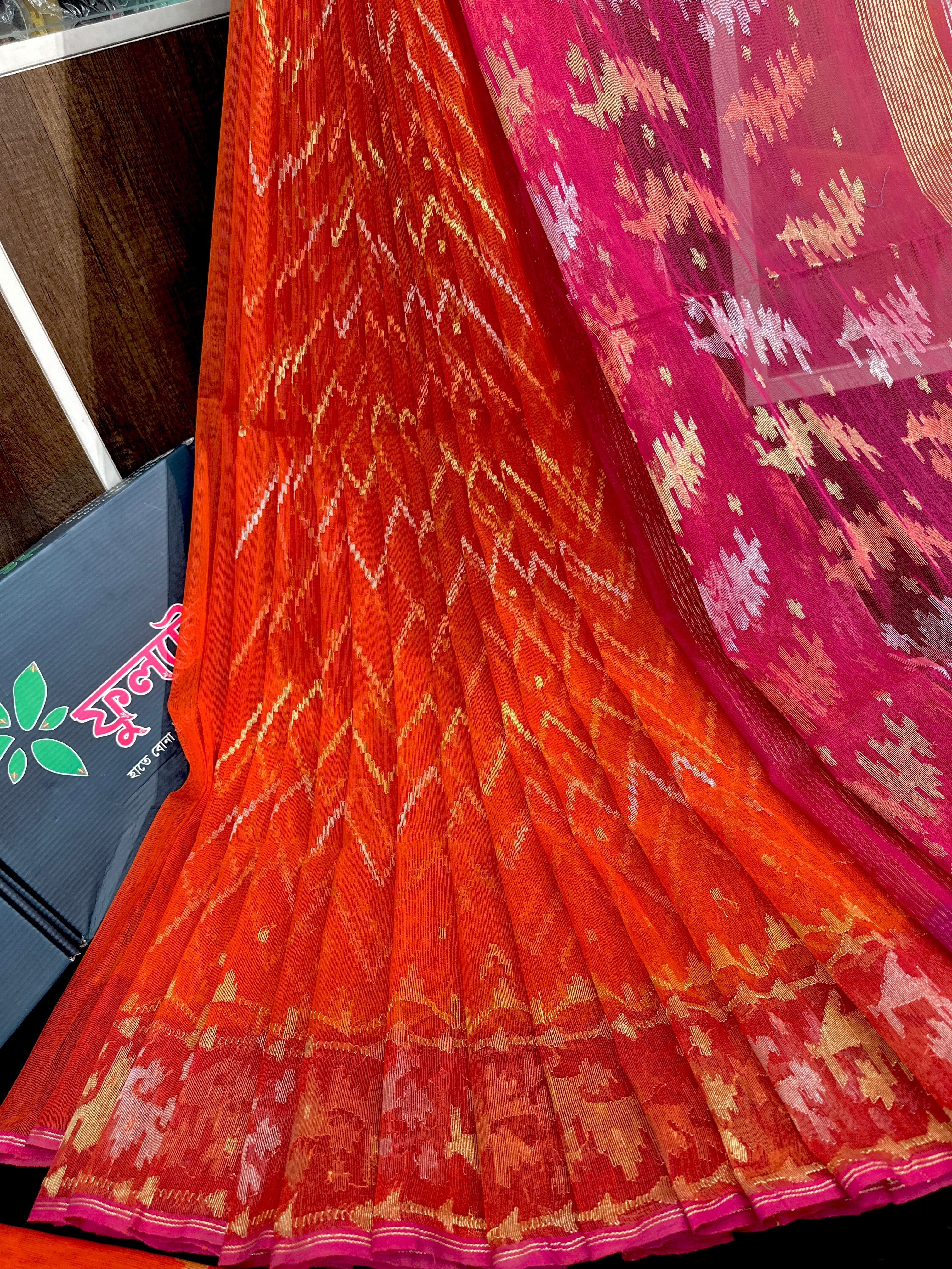 Orange halfsilk jamdani with magenta paar and golden silver & copper jori work