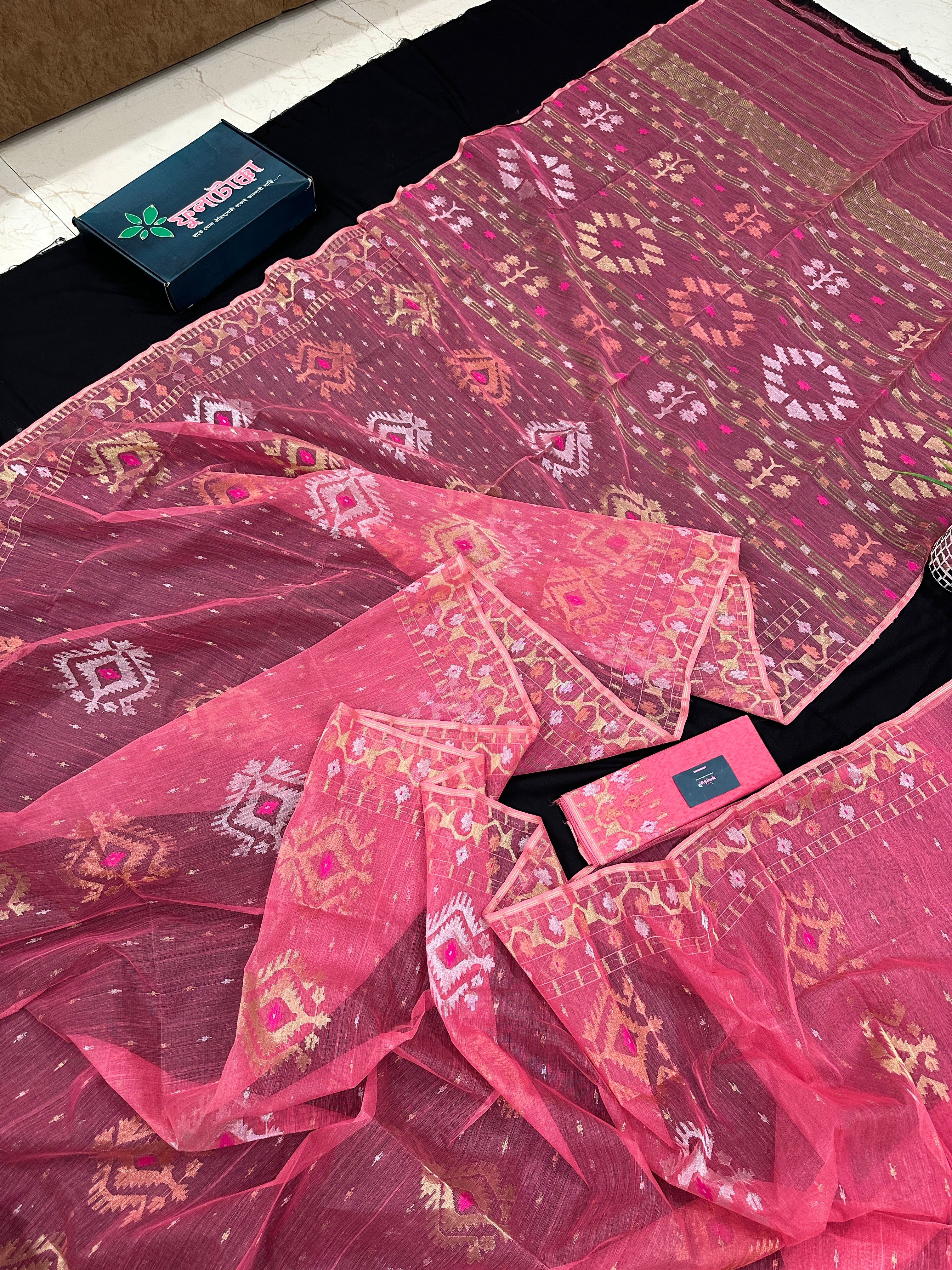 Peach pink jamdani saree with golden silver & copper jori work.