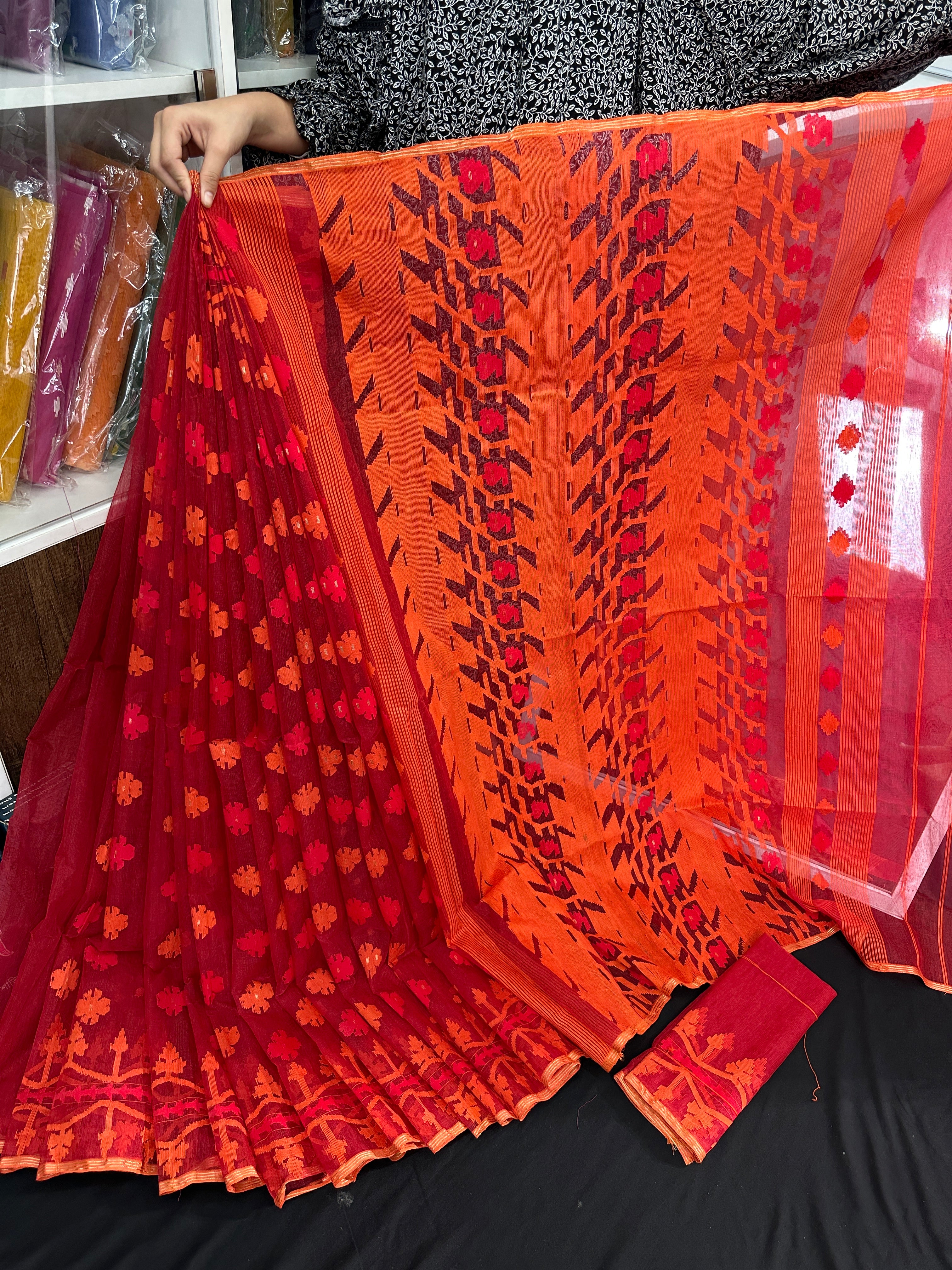 Maroon red jamdani saree with orange and red threads work