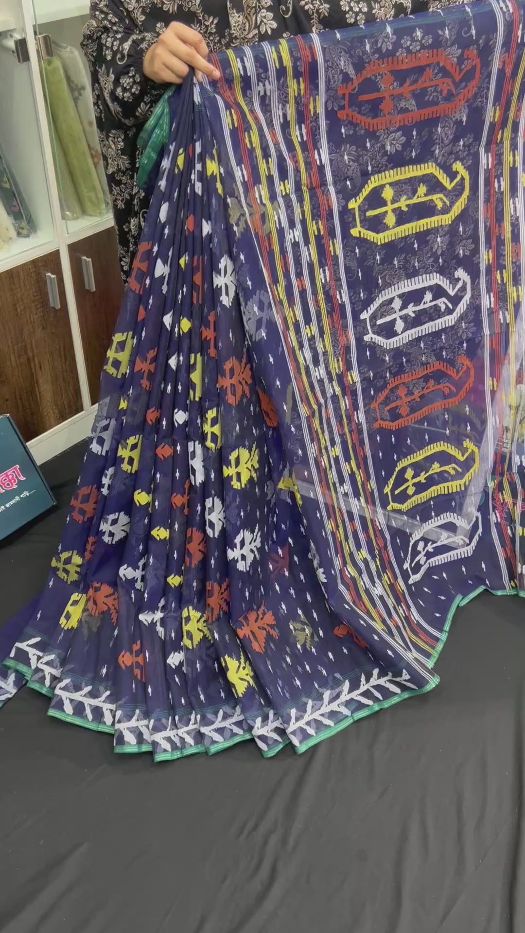 Deep blue halfsilk jamdani saree with orange yellow white threads work