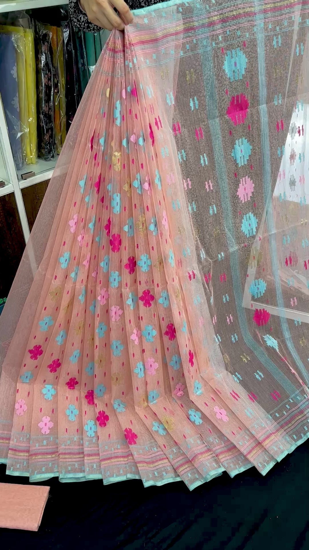Peach colour halfsilk jamdani saree with blue pink golden magenta threads work