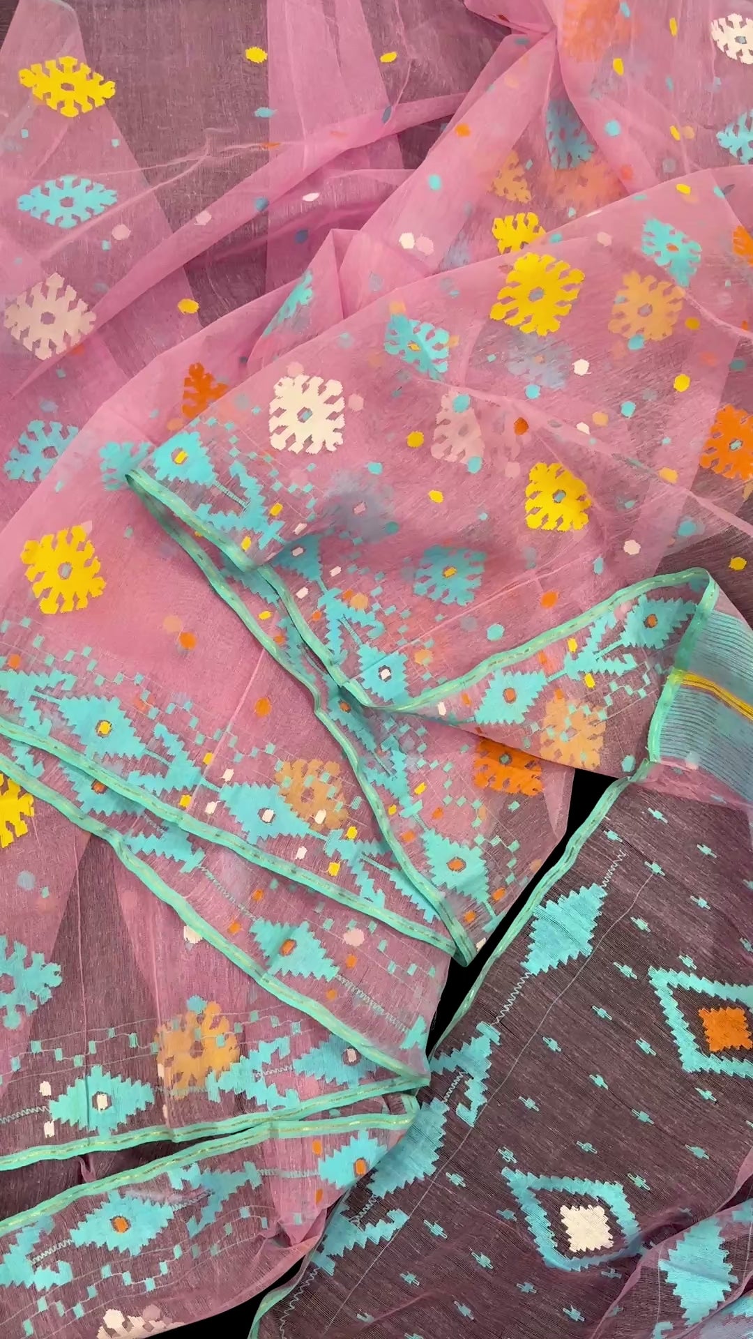 Pink jamdani saree with blue white yellow orange threads work and blouse piece.