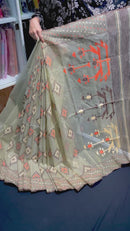 Dark olive halfsilk jamdani saree with orange off white coffe threads work