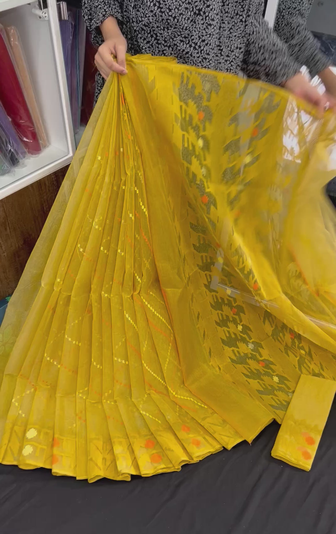 Yellow halfsilk jamdani saree with yellow orange threads work