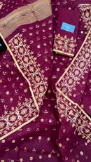 Maroon cotton jamdani with yellowish threads work.