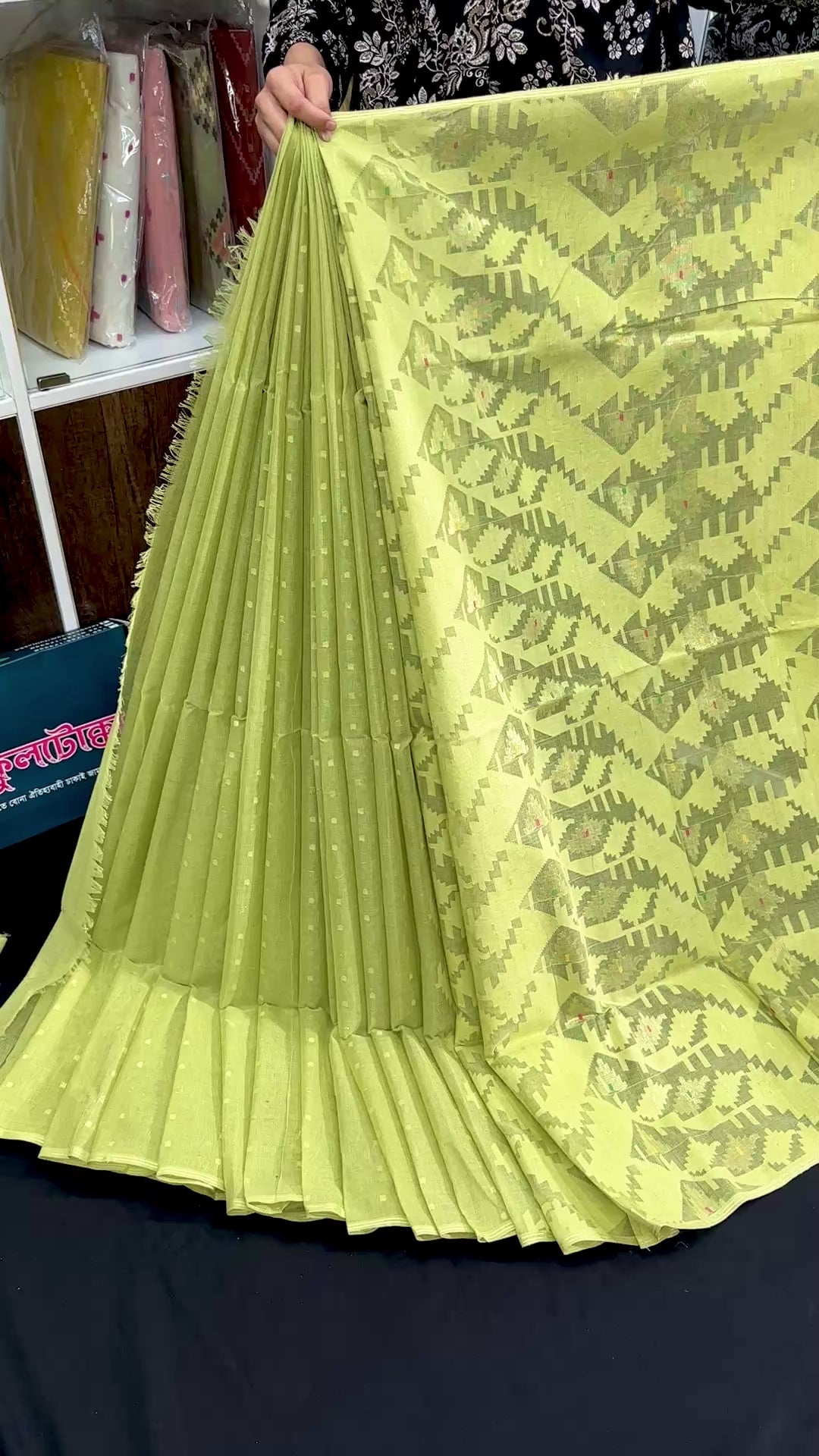 Olive jamdani saree with white threads work and self threads work